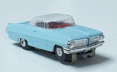 Atlas 1962 Pontiac Grand Prix Slot Car in Light Blue with White Hardtop 1