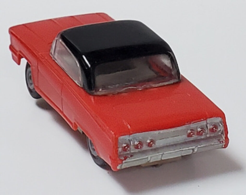 Atlas 1962 Chevy Impala HO Slot Car in Red with Black Hardtop The