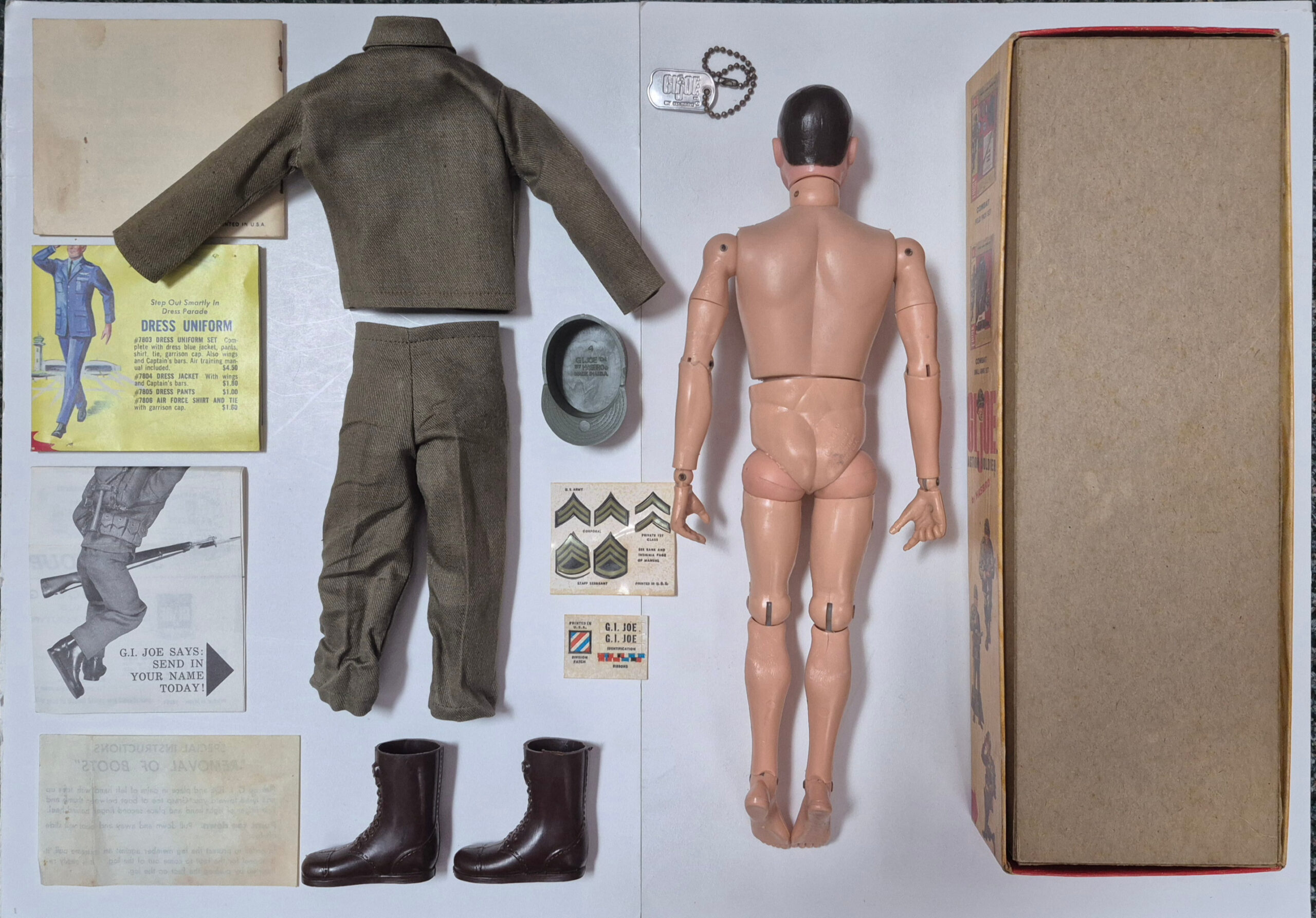 hasbro-1964-gi-joe-action-soldier-in-7500-box-2 1964 Hasbro G.I. Joe Action Soldier in Fatigues Uniform in 7500 Box with Paperwork 2