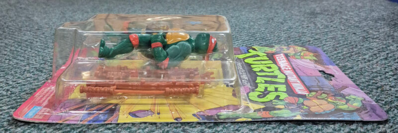 MOC 1988 Playmates TMNT 10-Back Michaelangelo Action Figure: Mint on Factory Sealed Card left side