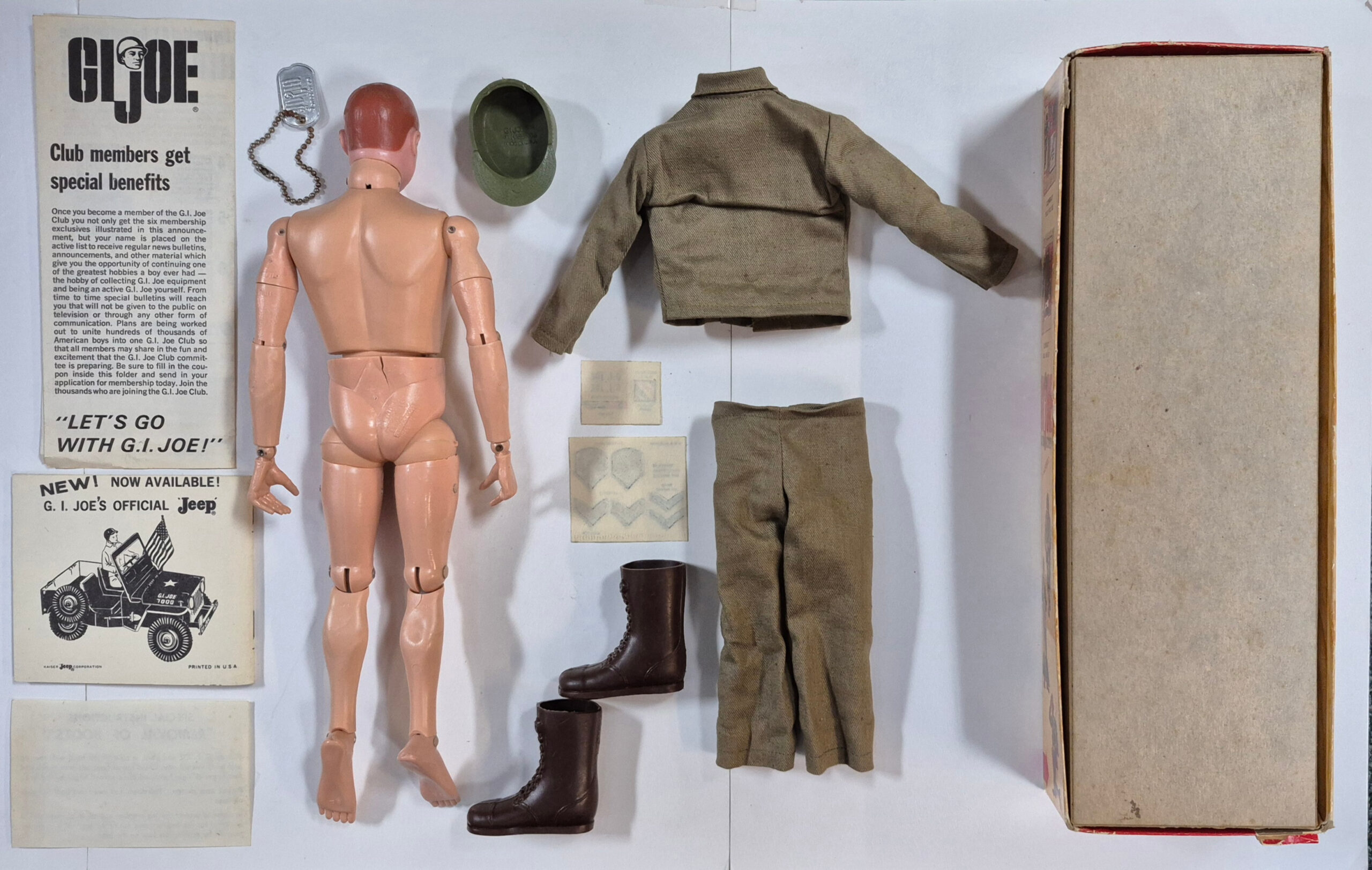 hasbro-1964-gi-joe-action-soldier-in-7500-box-2 1964 Hasbro G.I. Joe Action Soldier in Fatigues Uniform in 7500 Box with Paperwork & Rank Insignias 2